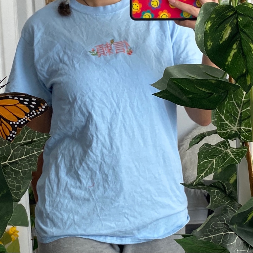 Light blue graphic tee shirt